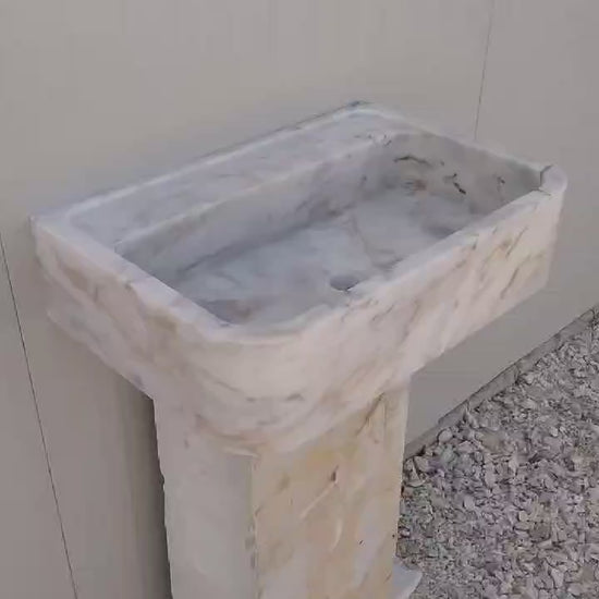 Floating marble basin