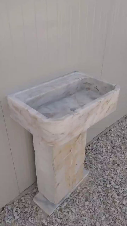 Floating marble basin