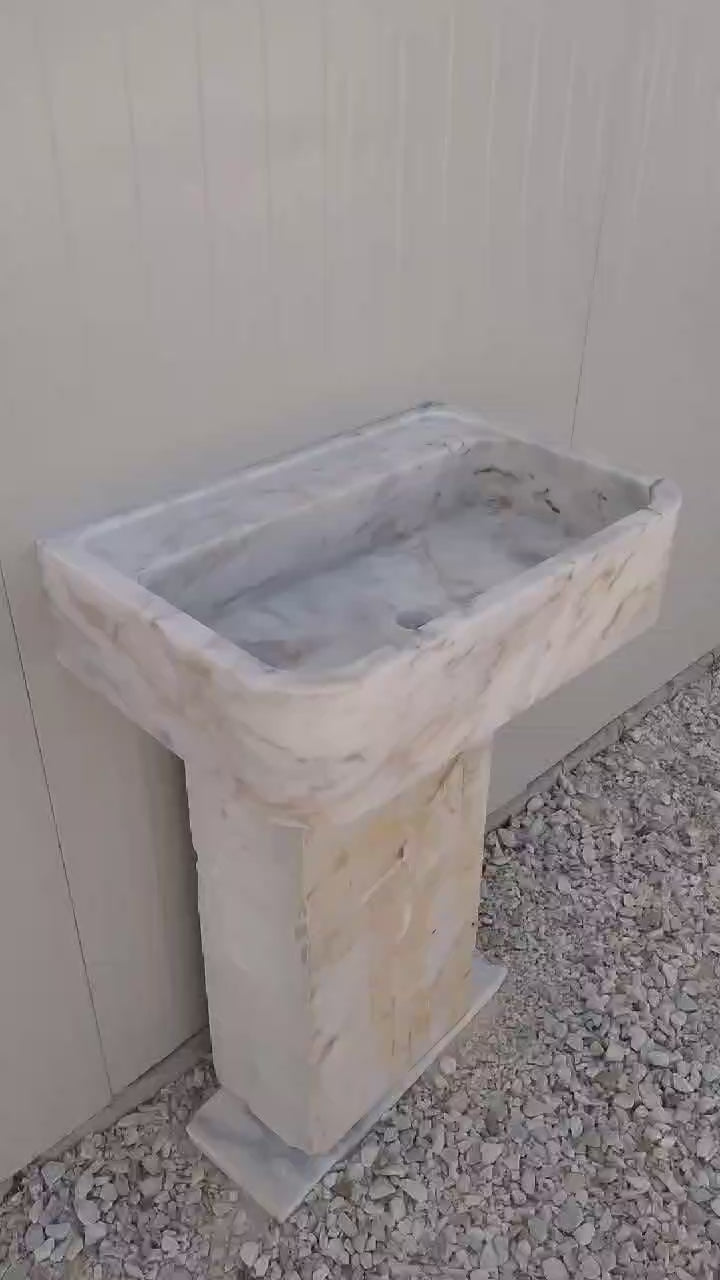 Floating marble basin